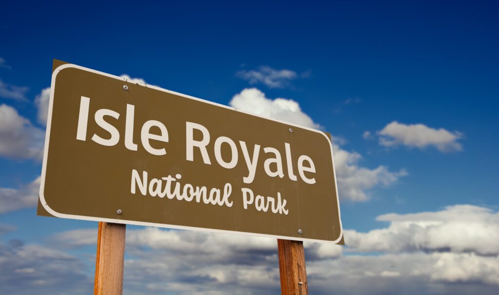 A brown sign for Isle Royale National Park.