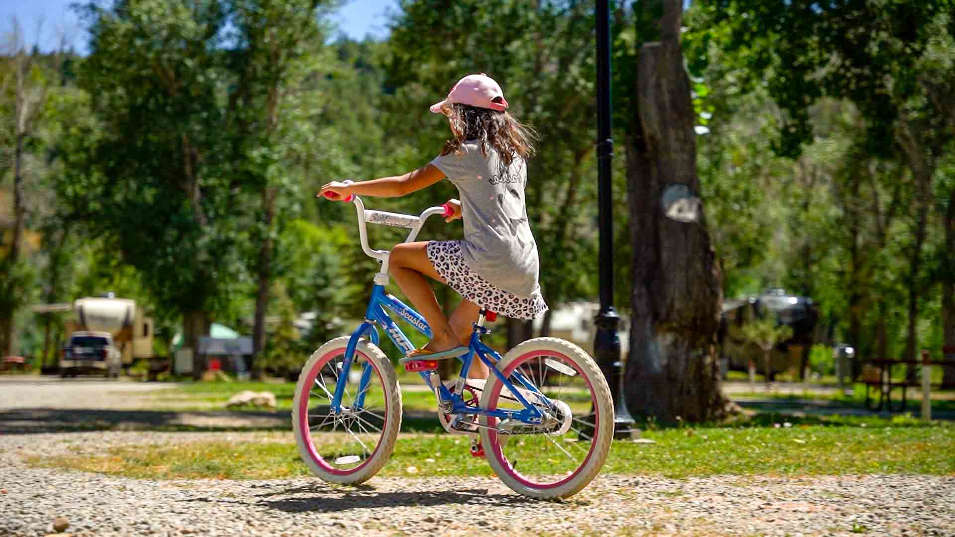 Pull-through RV sites with full hookups on the north shore of the Dolores River at Dolores River RV Resort