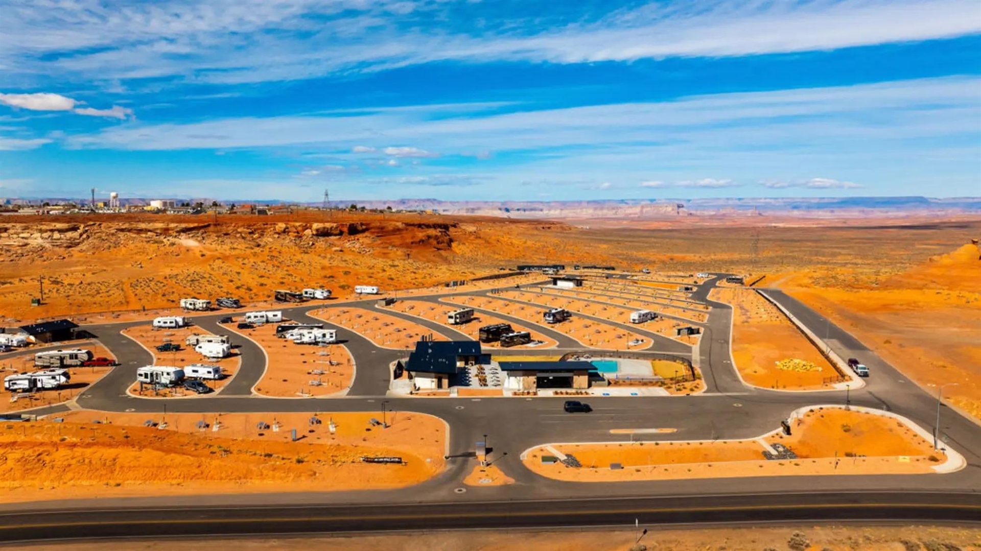 RV sites on gravel pads with red rock views at Roam Horseshoe Bend RV Resort in Page, Arizona