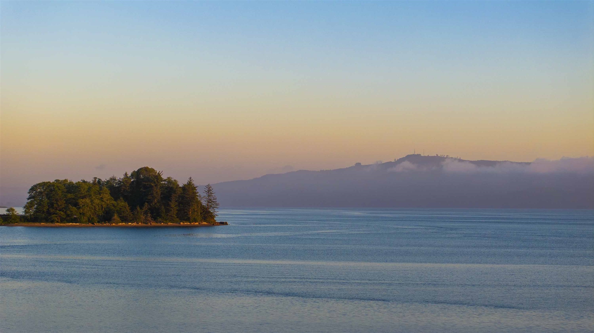 Full-hookup RV sites along Tillamook Bay at Roam Tillamook RV Resort in Garibaldi, Oregon