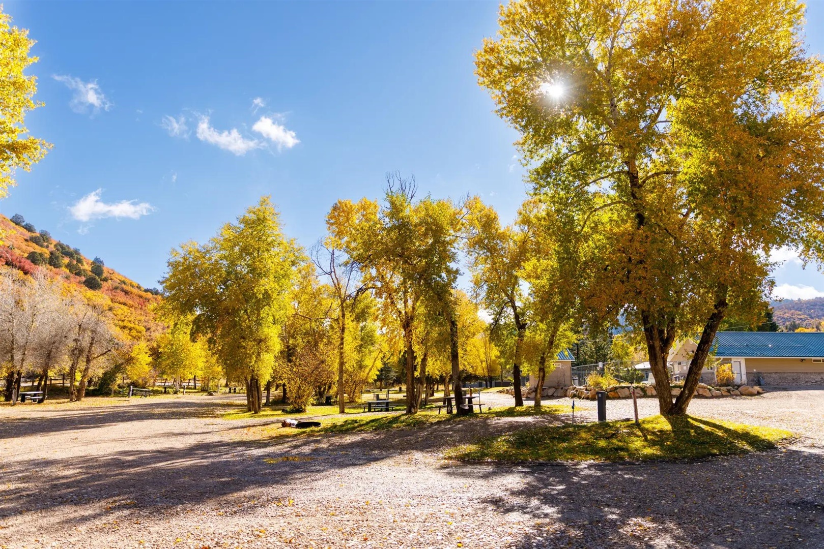 Autumn color over the riverside campground at Roam Uinta RV Resort near Park City and Heber City, Utah